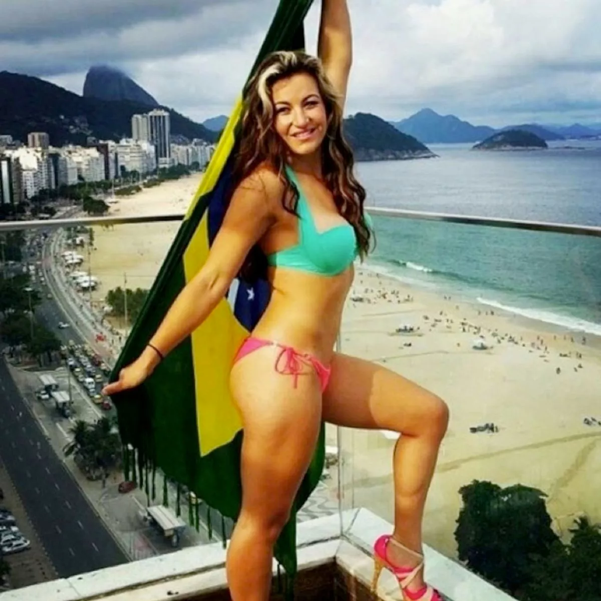 cathy seno add miesha tate boobs photo