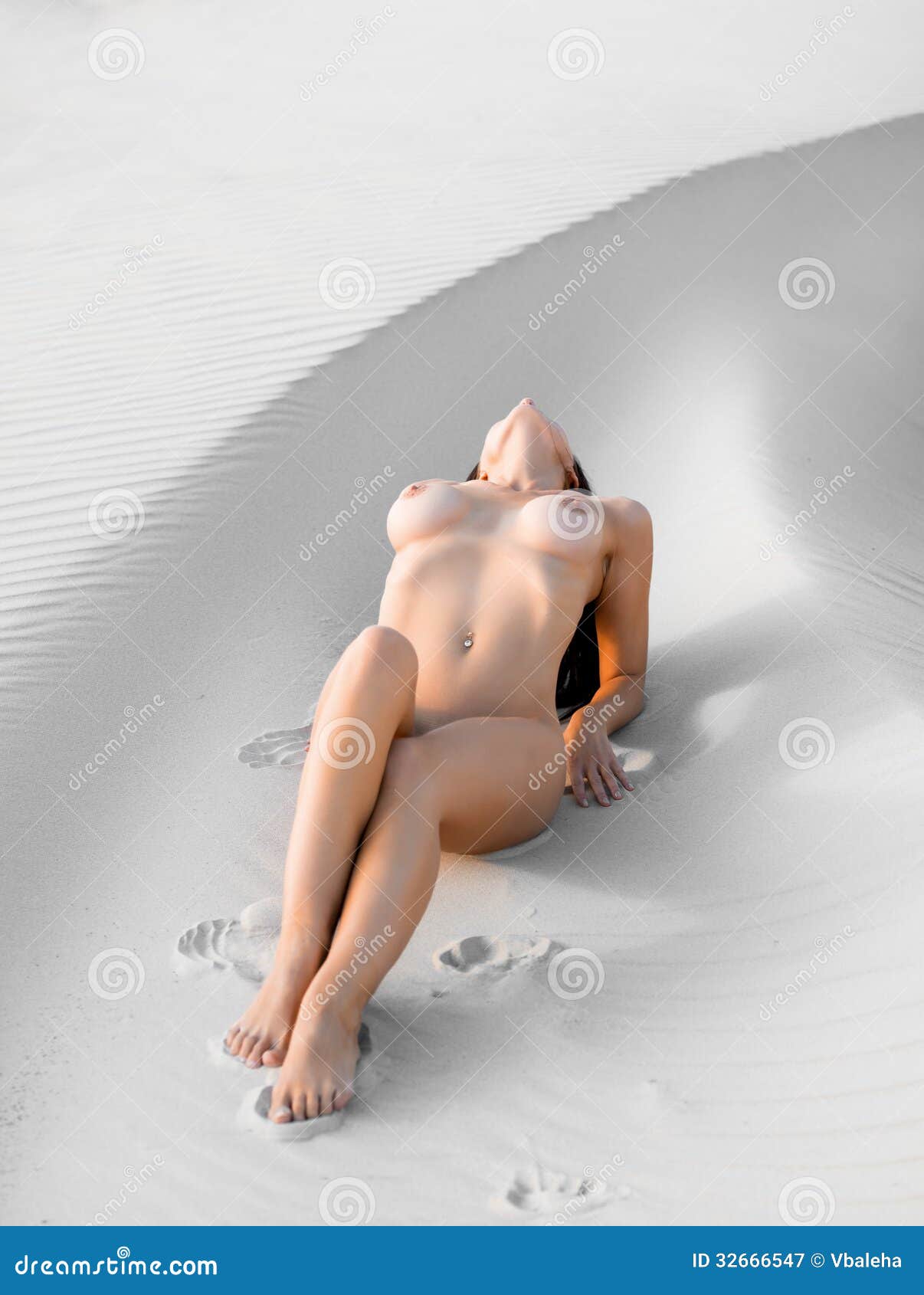 asal kia add the sand topless girl image