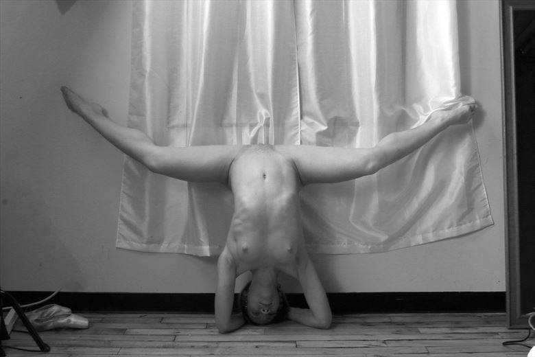 brian dennen add naked headstand photo