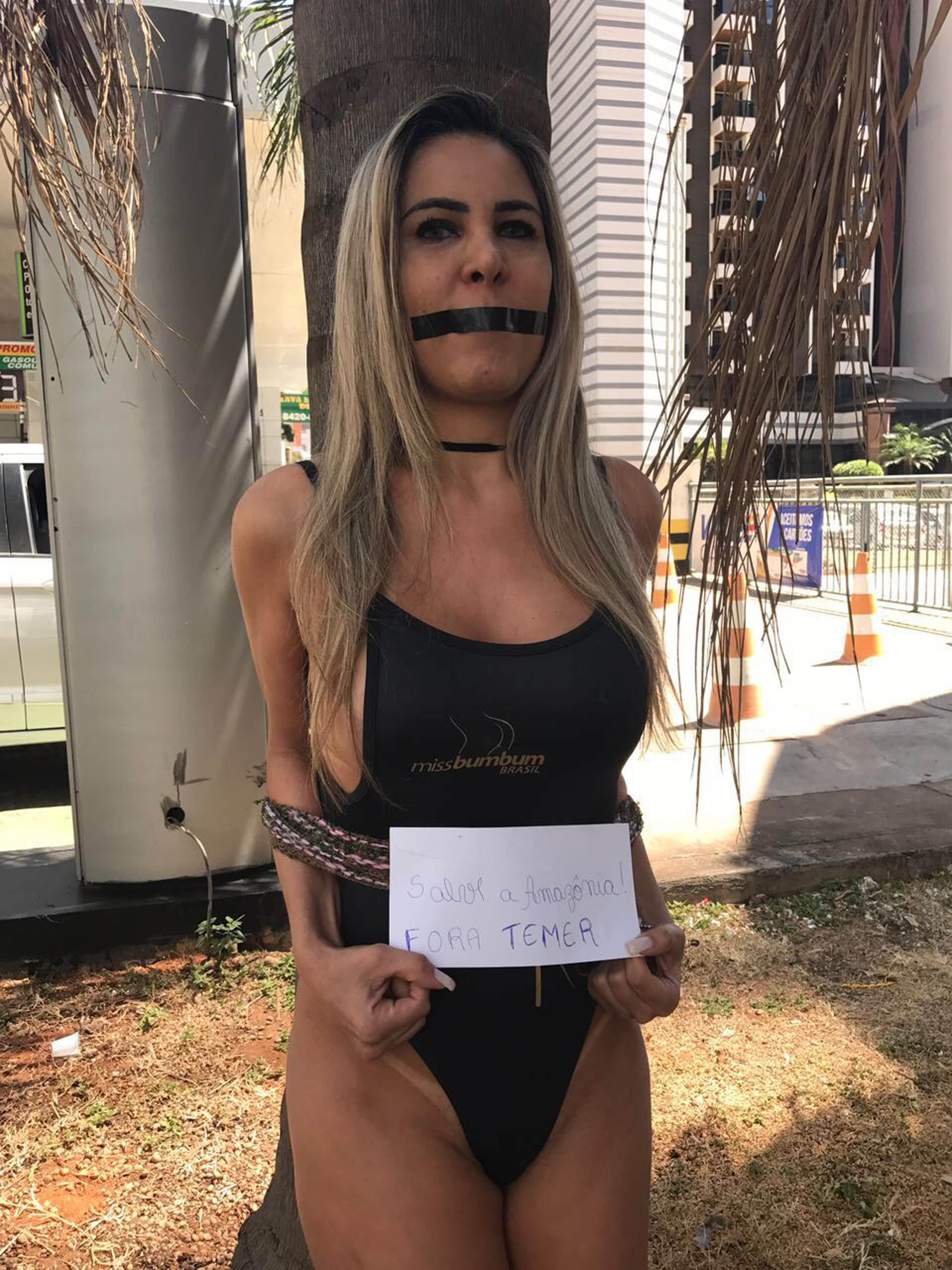 ali sabbaghi add bound and gagged in bikini image