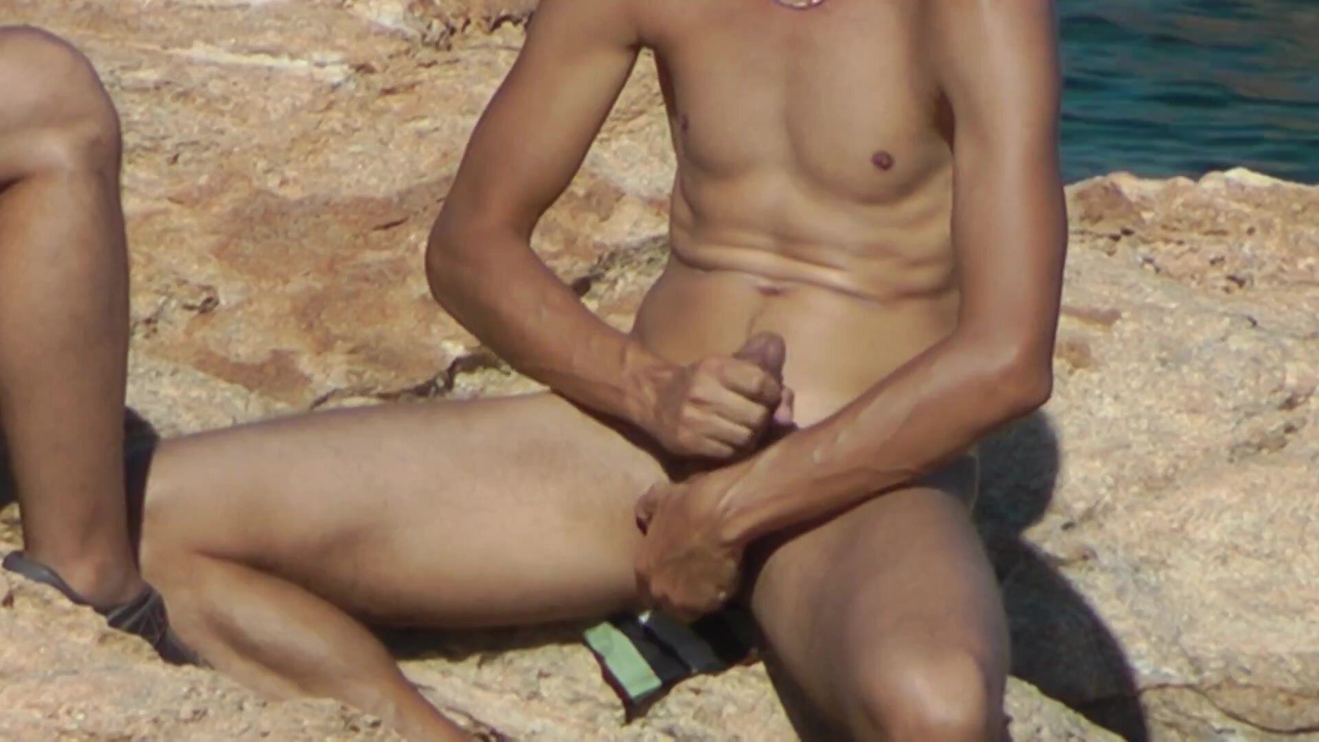 agus erwin add jerk off at the beach image