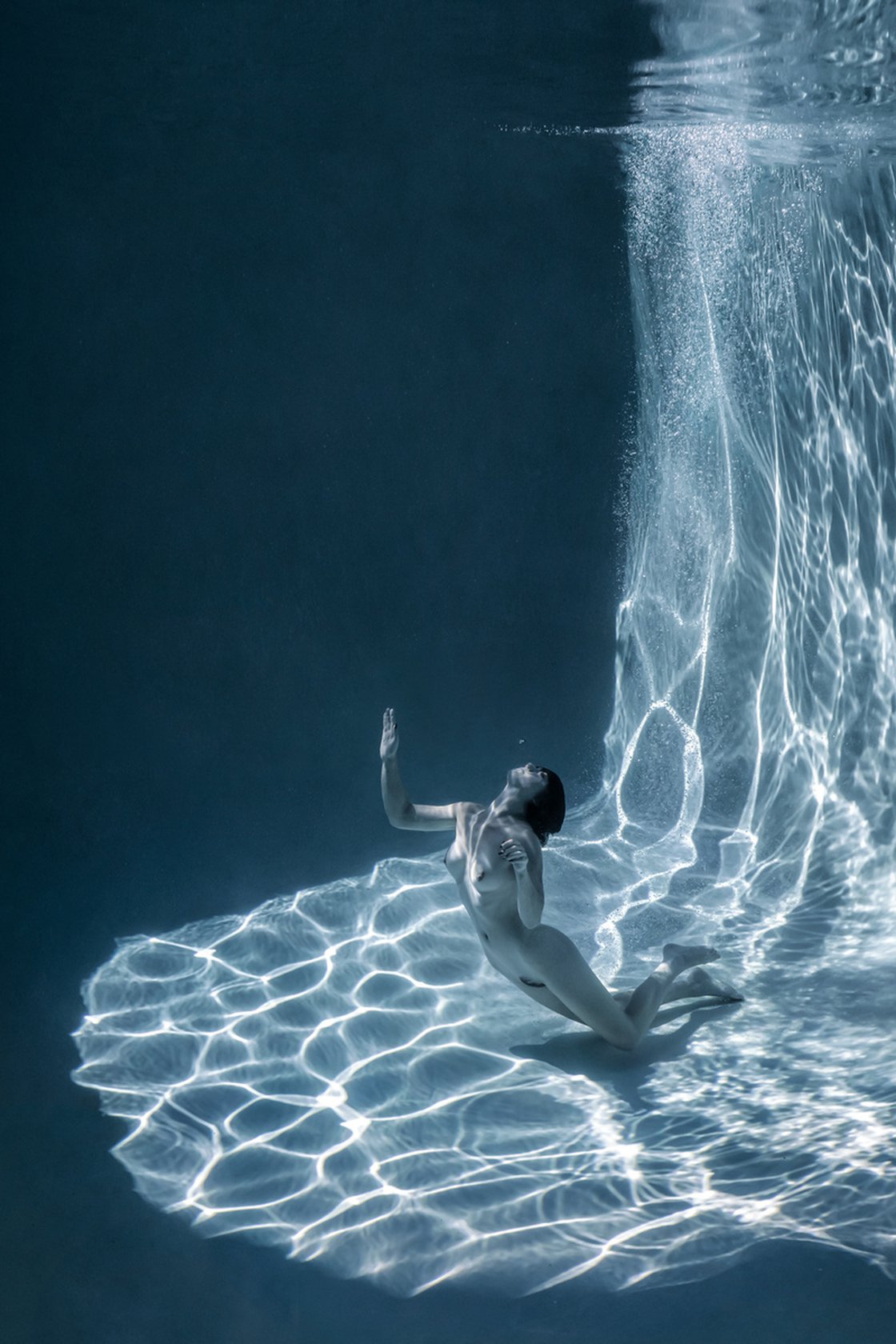 ajay ubale add nude men underwater image